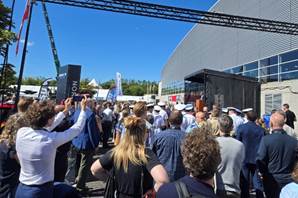 A group of people outside a building  AI-generated content may be incorrect.